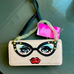 Finish that in your Betsy Johnson bedazzled lady face wallet on a blush.